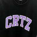 Corteiz CRTZ Arch Logo Oversized Tee – Black/Purple